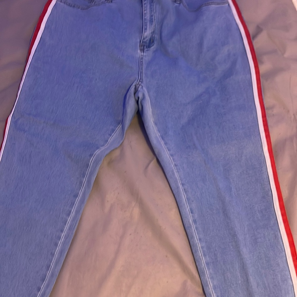 Pretty much new shein jeans with a red and white stripe down the side of the leg